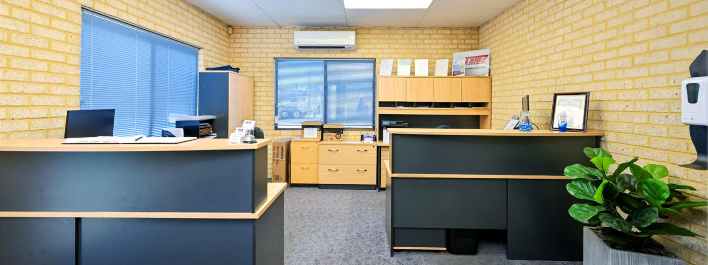 Inside look of office with two desks