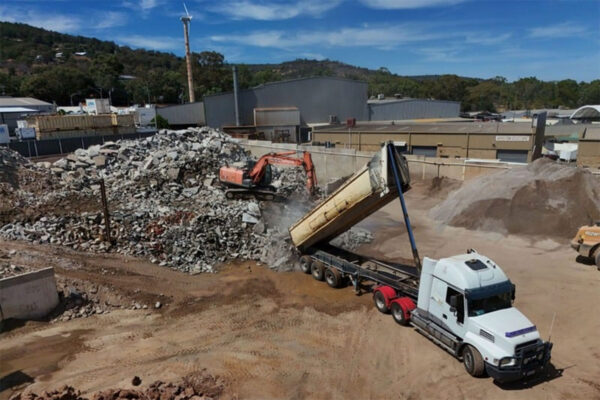 Large white dump truck at factory for sale at 11and-13 Keates Road Armadale